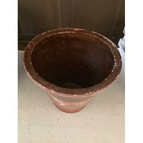 210 - TWO LARGE TWIN HANDLED  TERRACOTTA GARDEN POTS H18”DIA19” AND A MEDIUM ONE