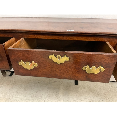 287 - EARLY OAK 3 DRAWER DRESSER WITH 2 PLANK TOP OVER 3 DRAWERS AND CARVED AND SHAPED FREIZE BELOW A/F H3... 