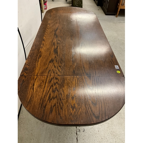 321 - REPRODUCTION OAK REFECTORY DINING TABLE WITH DROP LEAVES TO END H29”W54”EXT80”D30”