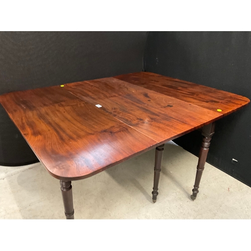 292 - GEORGIAN FLAMED MAHOGANY FDROP LEAF GATELEG DINING TABLE ON 6 LEGS WITH ORIGINAL BRASS CASTORS H29” ... 