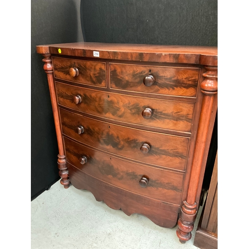 294 - VICTORIAN FLAMED MAHOGANY BOW FRONT 2 OVER 3 CHEST OF DRAWERS WITH COLUMN ENDS AND TURNED FEET WITH ... 