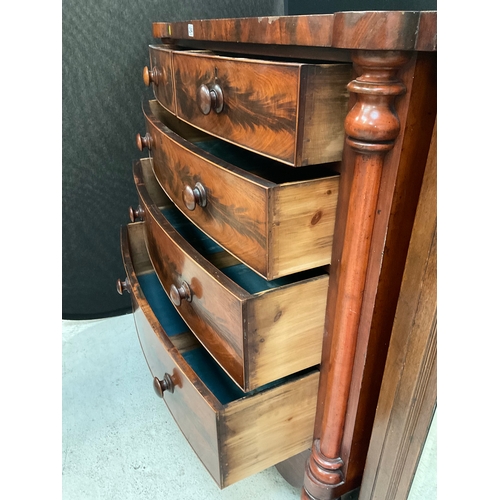 294 - VICTORIAN FLAMED MAHOGANY BOW FRONT 2 OVER 3 CHEST OF DRAWERS WITH COLUMN ENDS AND TURNED FEET WITH ... 