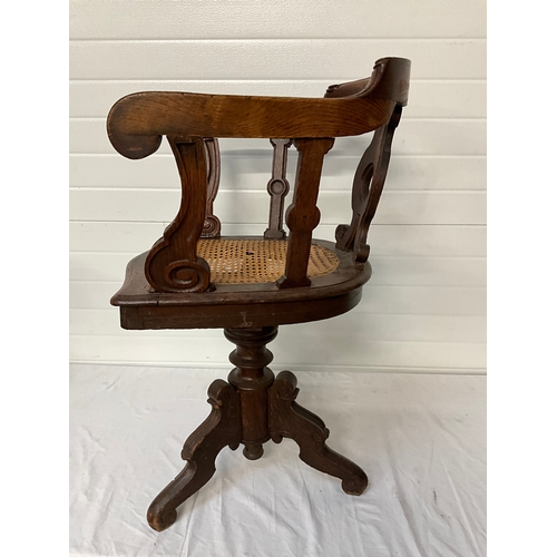 328 - VICTORIAN GERMAN OAK SWIVEL DESK CHAIR WITH BERGERE STYLE SEAT A/F
*THIS CHAIR BELONGED TO THE HENKE... 