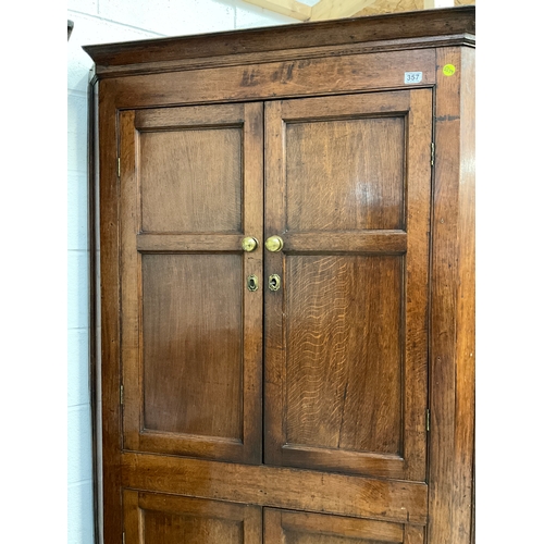 357 - GEORGIAN OAK DOUBLE CORNER CUPBOARD WITH KEY H84”W44”D25”