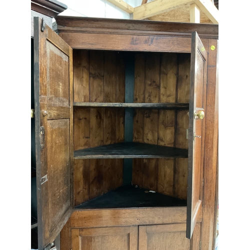 357 - GEORGIAN OAK DOUBLE CORNER CUPBOARD WITH KEY H84”W44”D25”