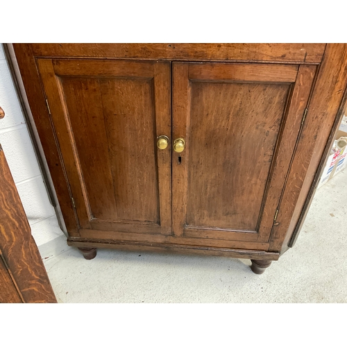 357 - GEORGIAN OAK DOUBLE CORNER CUPBOARD WITH KEY H84”W44”D25”