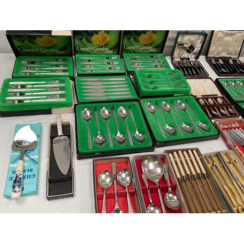 102 - LARGE SELECTION OF CUTLERY TO INCLUDE BOXED VINERS CUTLERY AND OTHER BOXED SETS.