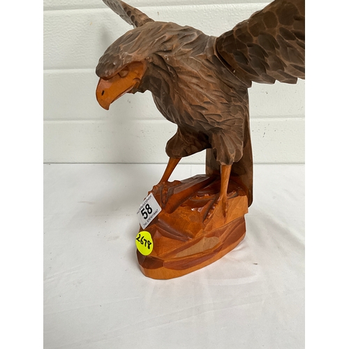 58 - CARVED BIRD OF PREY LANDING ON ROCK WITH DETACHABLE WINGS H13” WINGSPAN 23”