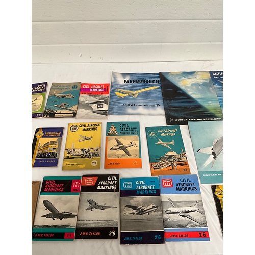 59 - COLLECTION OF VINTAGE TRANSPORT GUIDES ETC TO INCLUDE PLANES,BUSES ETC