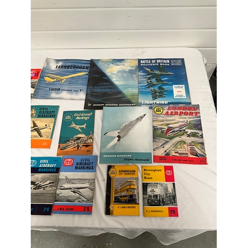 59 - COLLECTION OF VINTAGE TRANSPORT GUIDES ETC TO INCLUDE PLANES,BUSES ETC