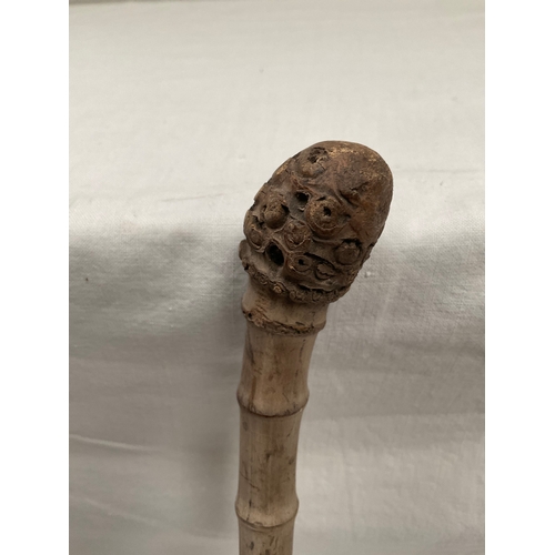 16 - VINTAGE SHOOTING STICK,VICTORIAN OAK BELLOWS AND INTRESTING BAMBOO CANE WITH CARVED TOP