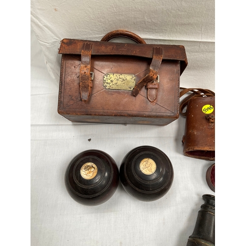 37 - VINTAGE BOWLS IN LEATHER CASE WITH BRASS PLAQUE AND FIELD GLASSES IN CASE