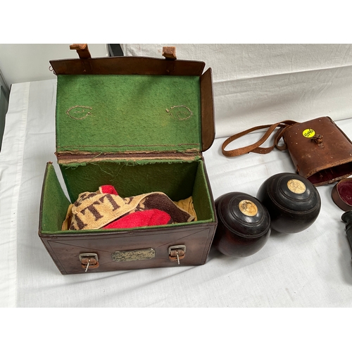 37 - VINTAGE BOWLS IN LEATHER CASE WITH BRASS PLAQUE AND FIELD GLASSES IN CASE