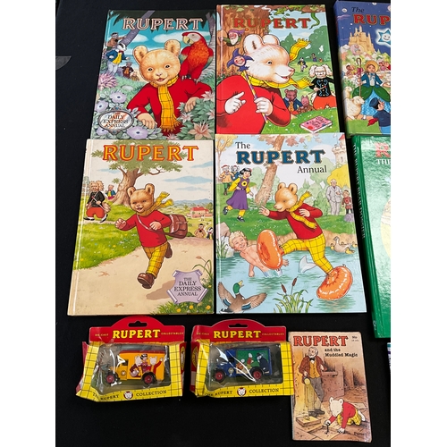 63 - COLLECTION OF VINTAGE RUPERT THE BEAR BOOKS AND 2 BOXED LORRIES