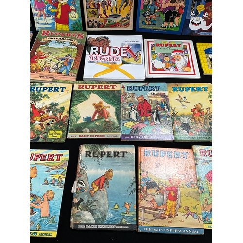 63 - COLLECTION OF VINTAGE RUPERT THE BEAR BOOKS AND 2 BOXED LORRIES