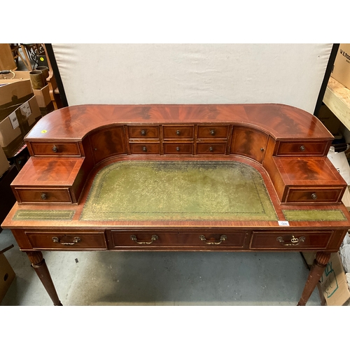 500 - REPRODUCTION MAHOGANY VENEERED WITH LEATHER INSET TOP AND GALLERY BAVK WRITING DESK A/F H38” 55” D28... 