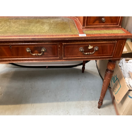 500 - REPRODUCTION MAHOGANY VENEERED WITH LEATHER INSET TOP AND GALLERY BAVK WRITING DESK A/F H38” 55” D28... 