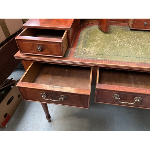 500 - REPRODUCTION MAHOGANY VENEERED WITH LEATHER INSET TOP AND GALLERY BAVK WRITING DESK A/F H38” 55” D28... 