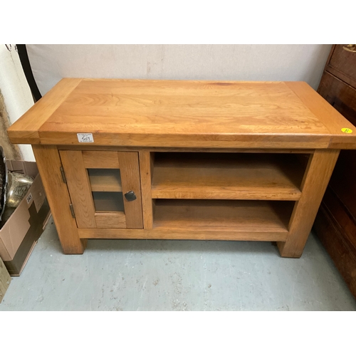 507 - MODERN OAK TV STAND WITH DOOR AND AND 2 SHELVES H20” W36” D17”