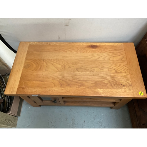 507 - MODERN OAK TV STAND WITH DOOR AND AND 2 SHELVES H20” W36” D17”