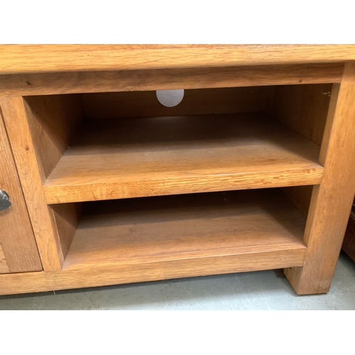 507 - MODERN OAK TV STAND WITH DOOR AND AND 2 SHELVES H20” W36” D17”