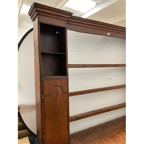 510 - EARLY OAK AND MAHOGANY CROSS BANDED DRESSER WITH OPEN SHELVED RACK TO TOP FLANKED BY 2 DOORS - BASE ... 