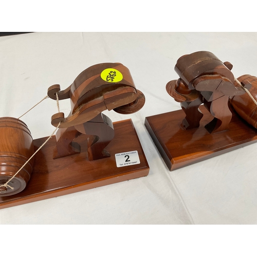 2 - A PAIR OF DECORATIVE WOODEN BOOK ENDS