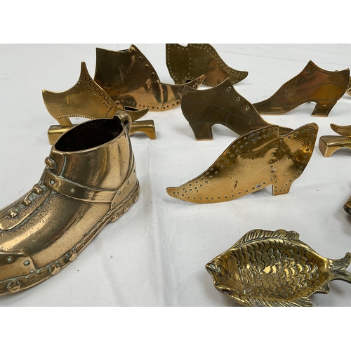 9 - A QUANTITY OF DECORATIVE BRASS ITEMS TO INCLUDE SHOES AND A BELL IN THE SHAPE OF A WELSH LADY