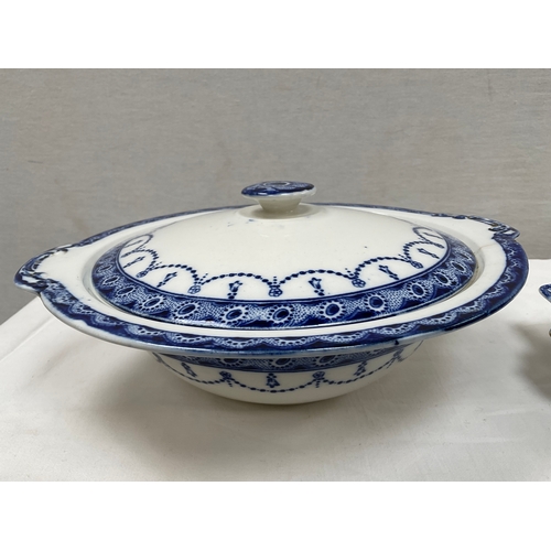 17 - LARGE QUANTITY OF BLUE AND WHITE CHINA WARE TO INCLUDE TWO LARGE CHARGERS, TWO LIDDED VEGETABLE DISH... 