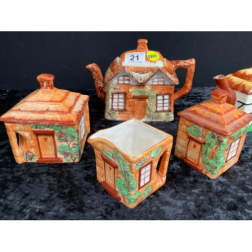 21 - COTTAGE WARE MILK JUG, TWO SUGAR BOWLS AND TWO TEAPOTS