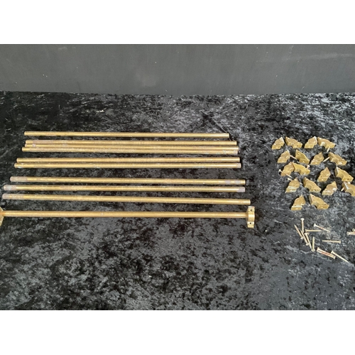 25 - TEN BRASS STAIR RODS 22” WITH FIXINGS