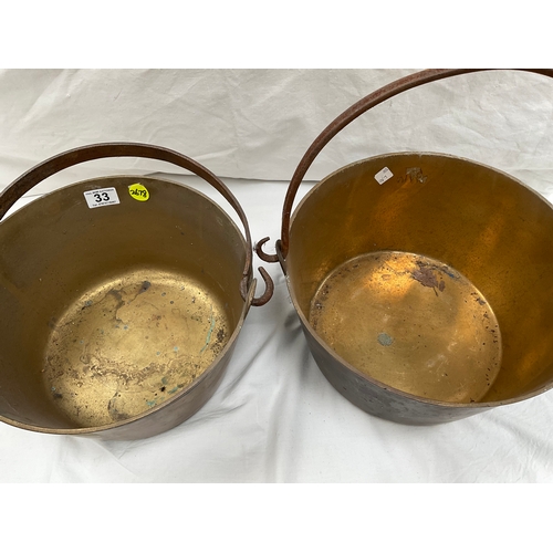 33 - TWO ANTIQUE BRASS JAM PANS