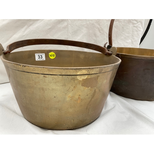 33 - TWO ANTIQUE BRASS JAM PANS