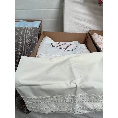 66 - FOUR BOXES OF LINEN, QUILTS, BLANKETS ETC