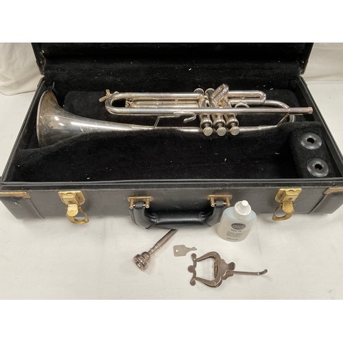 115 - VINTAGE BACH OMEGA CASED TRUMPET COMPLETE WITH MOUTHPIECE AND MUSIC STAND