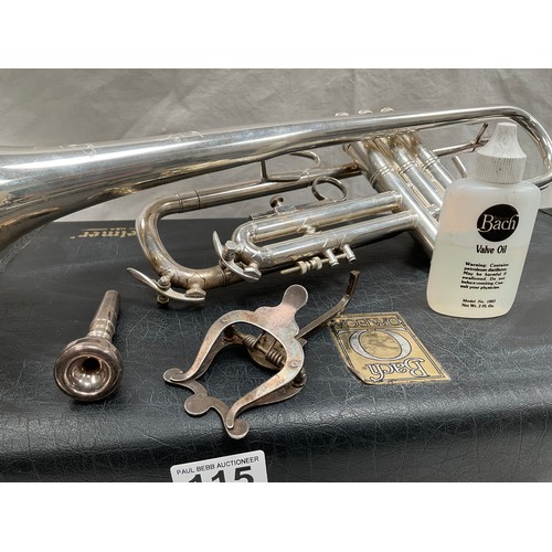 115 - VINTAGE BACH OMEGA CASED TRUMPET COMPLETE WITH MOUTHPIECE AND MUSIC STAND