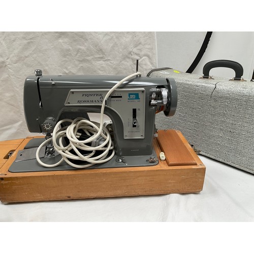 120 - FRISTER AND ROSSMAN ELECTRIC SEWING MACHINE AND A VINTAGE SINGER HAND SEWING MACHINE BOTH IN CASES