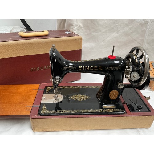 120 - FRISTER AND ROSSMAN ELECTRIC SEWING MACHINE AND A VINTAGE SINGER HAND SEWING MACHINE BOTH IN CASES