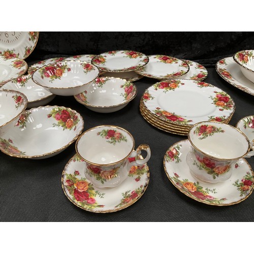 143 - LARGE ROYAL ALBERT COUNTRY ROSE DINNER AND TEA SERVICE TO INCLUDE CLOCK, CAKE STAND ETC - SIXTY TWO ... 