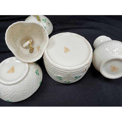 152 - FIVE PIECES OF BELLEEK CHINA TO INCLUDE TWO SHELL PIECES AND FOUR DECORATED PIECES - JUG IS A/F