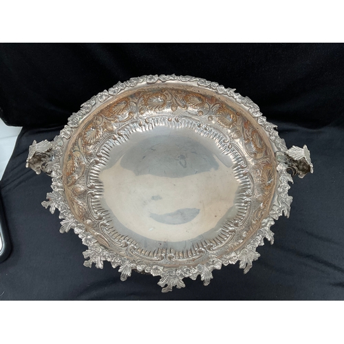 161 - HEAVILY DECORATED WITH FOILAGE TWIN HANDLED CENTREPIECE OR BOWL RIASED ON 4 FEET  STAMPED 925 - WEIG... 