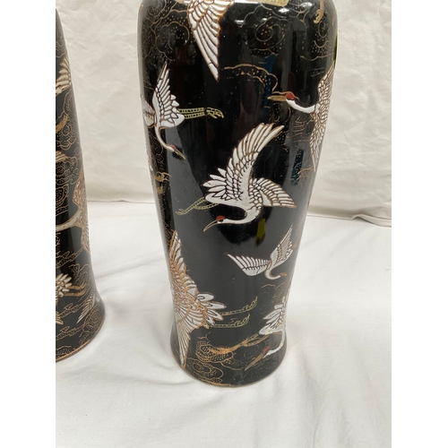 162 - PAIR OF BALCK DECORATED WITH BIRDS VASES BADGED ICEBERG 14” DIA 5”