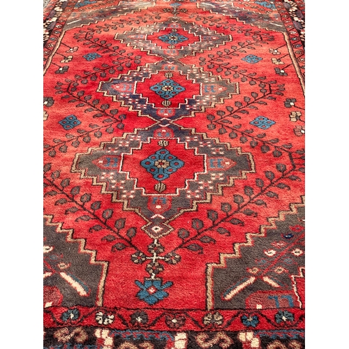 1 - VINTAGE RED PATTERNED CARPET 80” x 61”