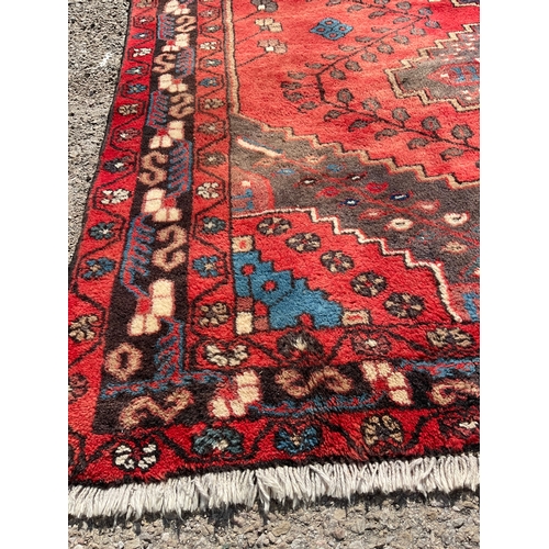 1 - VINTAGE RED PATTERNED CARPET 80” x 61”