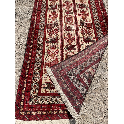 8 - VINTAGE PATTERNED RED CARPET 73” x 39”