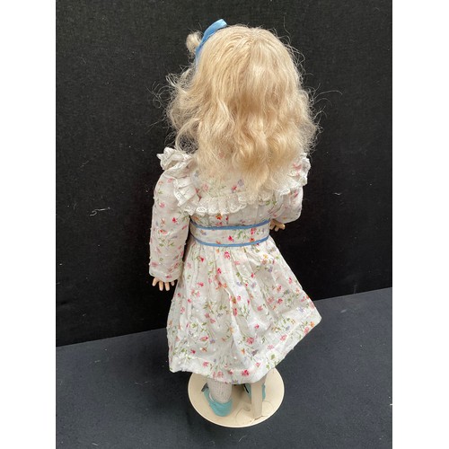 18 - CHINA COLLECTORS DOLL ON STAND H20”