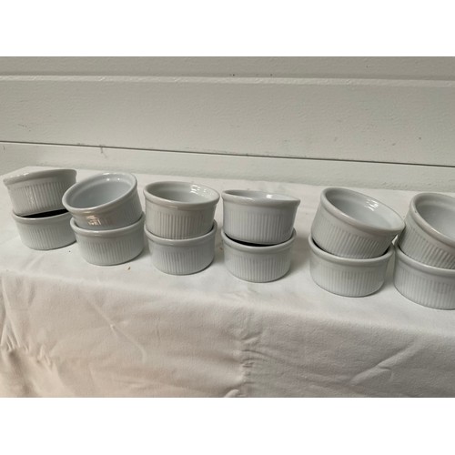 63 - CRATE OF CATERING PLASTIC SERVING PLATES,METAL DISHES AND RAMEKINS