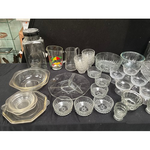 141 - 2 BOXES OF GLASSWARE TO INCLUDE JUGS,VASES COLOURED GLASS ETC