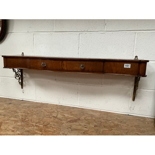 161 - VICTORIAN MAHOGANY SERPENTINE FRONTED CONSOLE WALL SHELF WITH 2 DRAWERS SUPPORTED ON BRASS DECORATIV... 