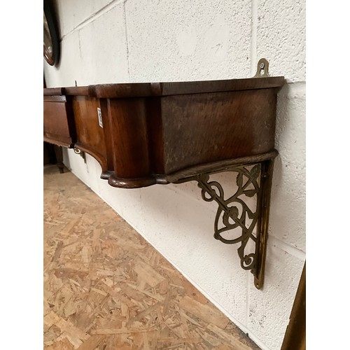 161 - VICTORIAN MAHOGANY SERPENTINE FRONTED CONSOLE WALL SHELF WITH 2 DRAWERS SUPPORTED ON BRASS DECORATIV... 